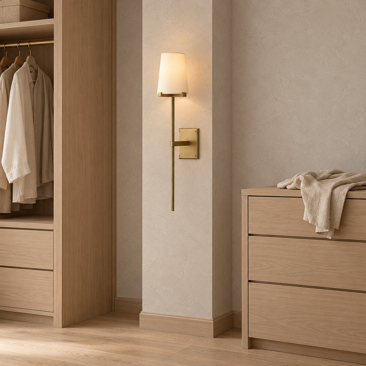 Savorel copper colored rechargeable wall sconce, 14 cm wide, lit beside dressing room cabinetry