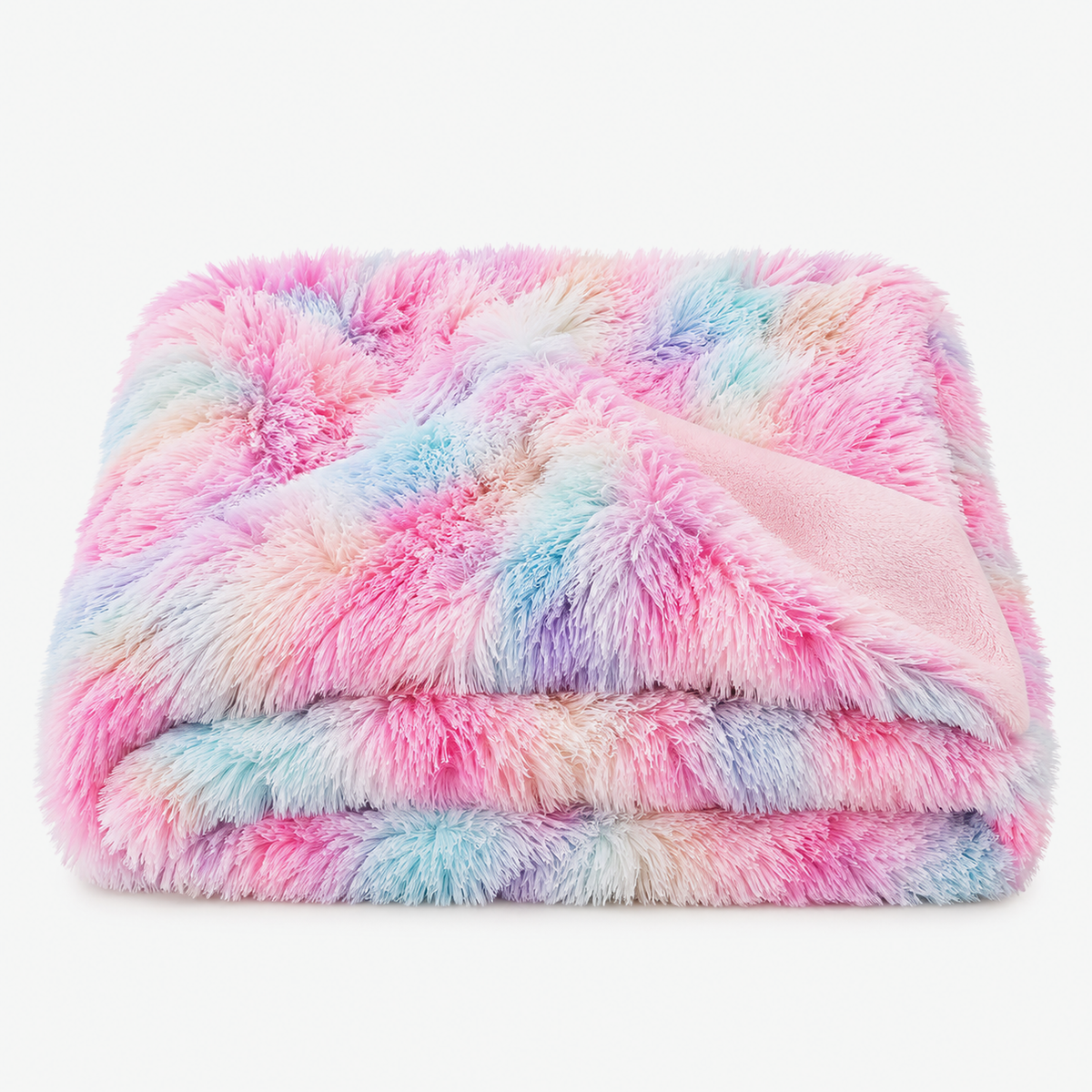 Selovan pastel multicolor faux fur throw blanket loosely folded on a plain studio backdrop