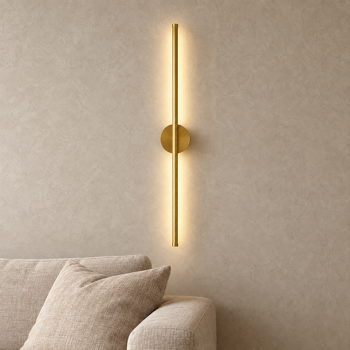 Senolira gold LED wall sconce lit above a sofa corner in a formal sitting room by day