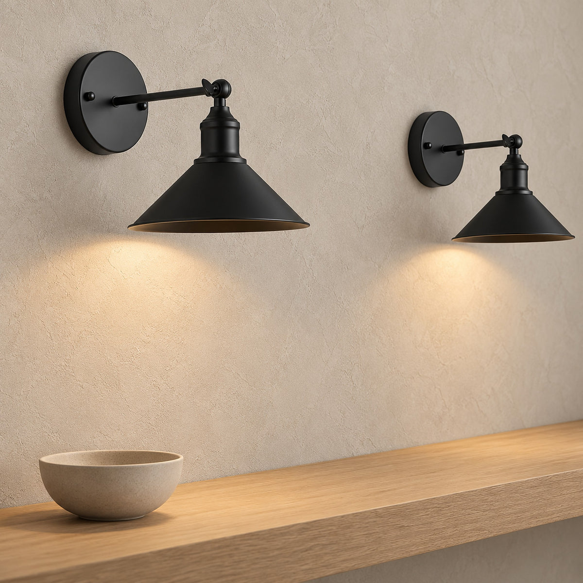 Sevarlo black battery operated wall sconce pair lit on a bare wall above a stair landing in daylight