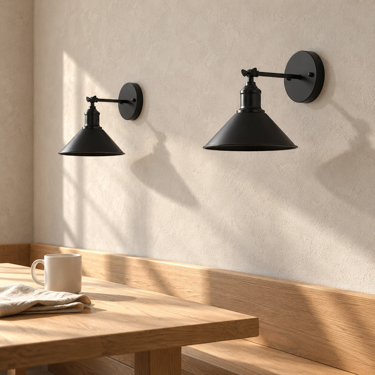 Sevarlo black wall light pair unlit in direct sunlight above a breakfast nook