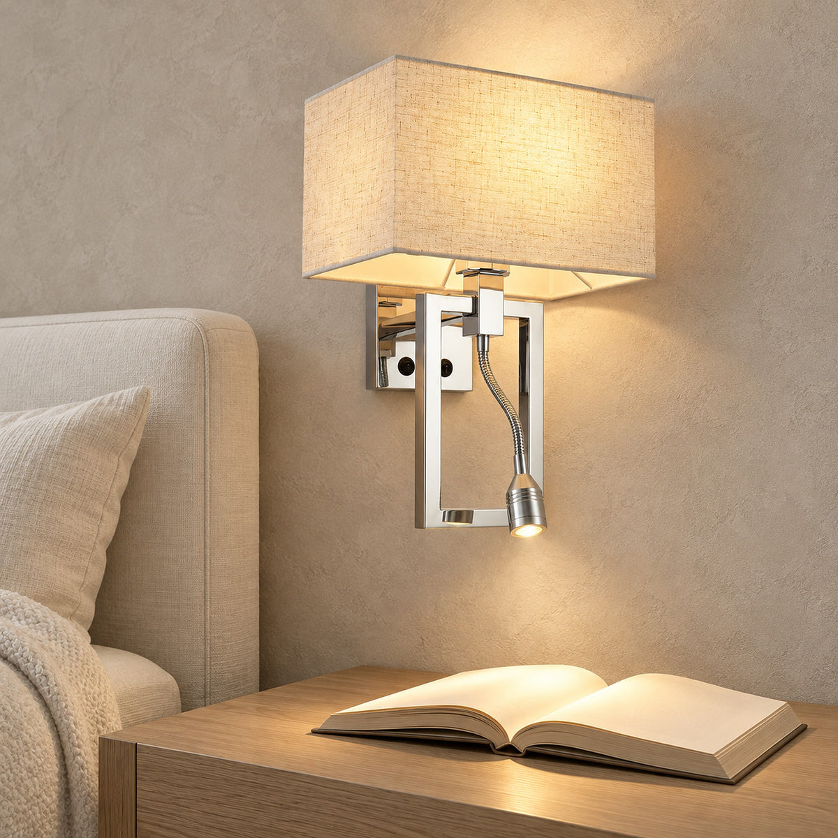 Silarno chrome wall lamp with its gooseneck reading lamp lighting a book beside a daybed in a library alcove