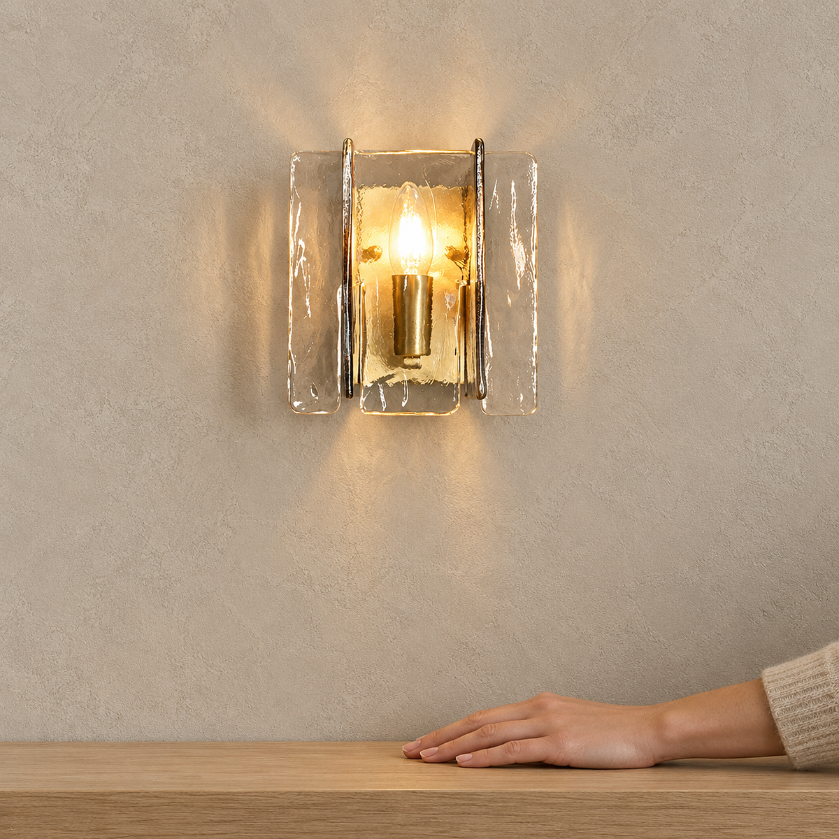 Simaelo black wall light glowing with its installed bulb above a hallway console