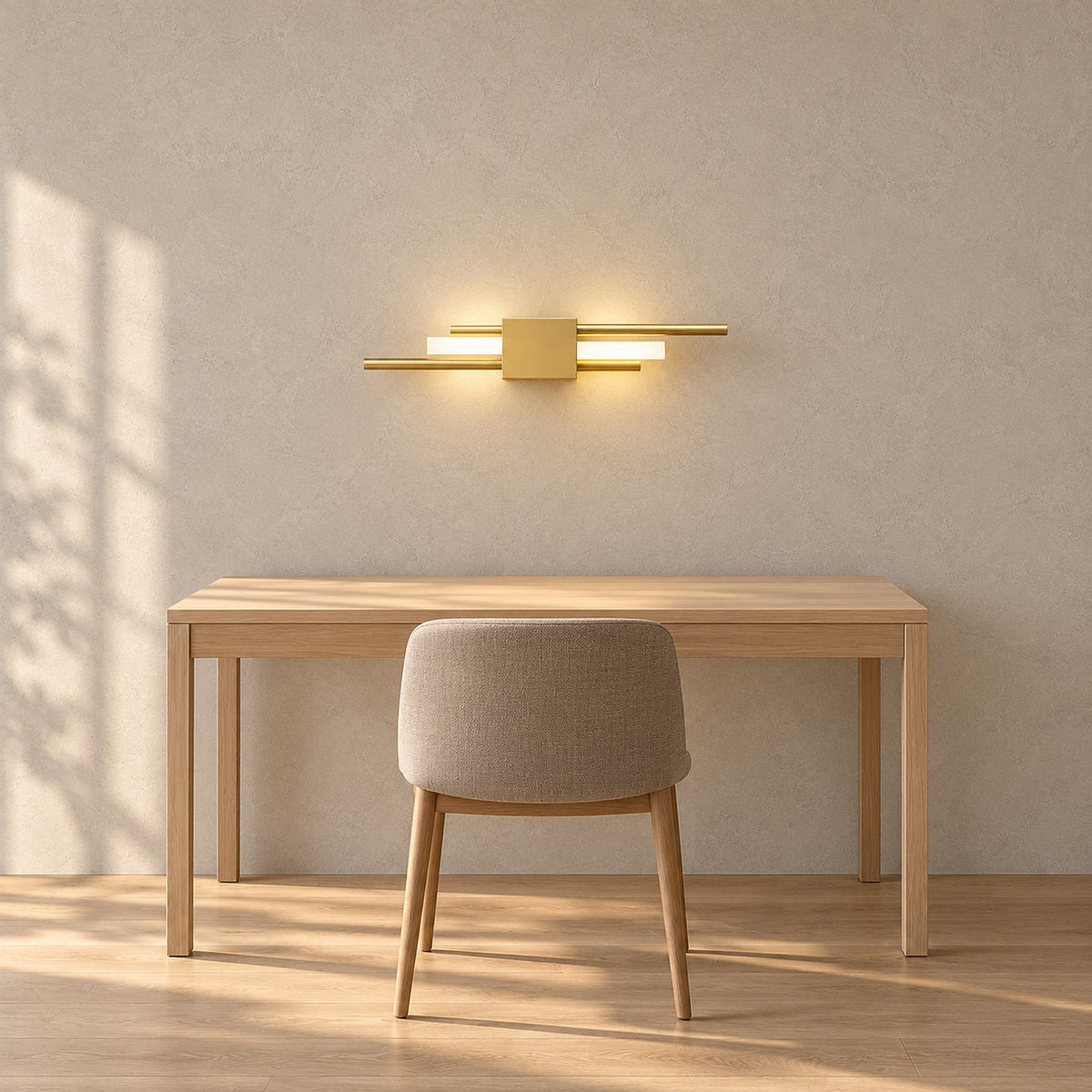 Sorlimo gold and white wall lamp mounted horizontally above a writing desk in a home office by day