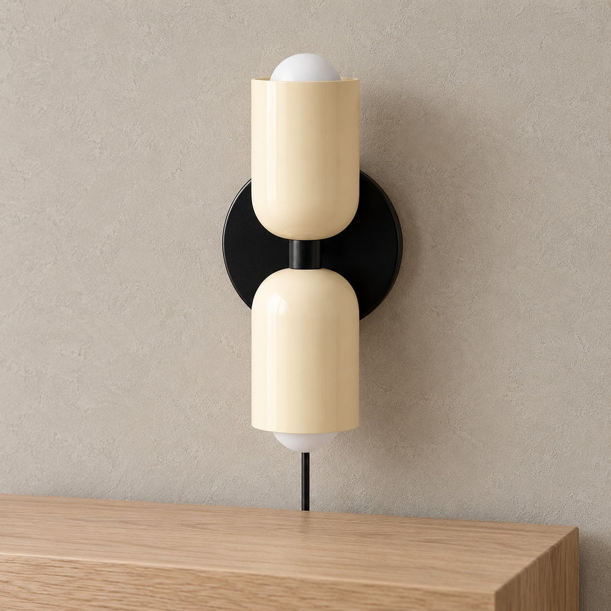 Talomi beige wall lamp close up of the metal shade and separate bulb dome