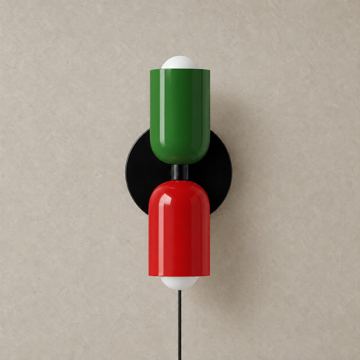 Talomi green and red wall sconce unlit on a plain backdrop showing its finish #color_green & red