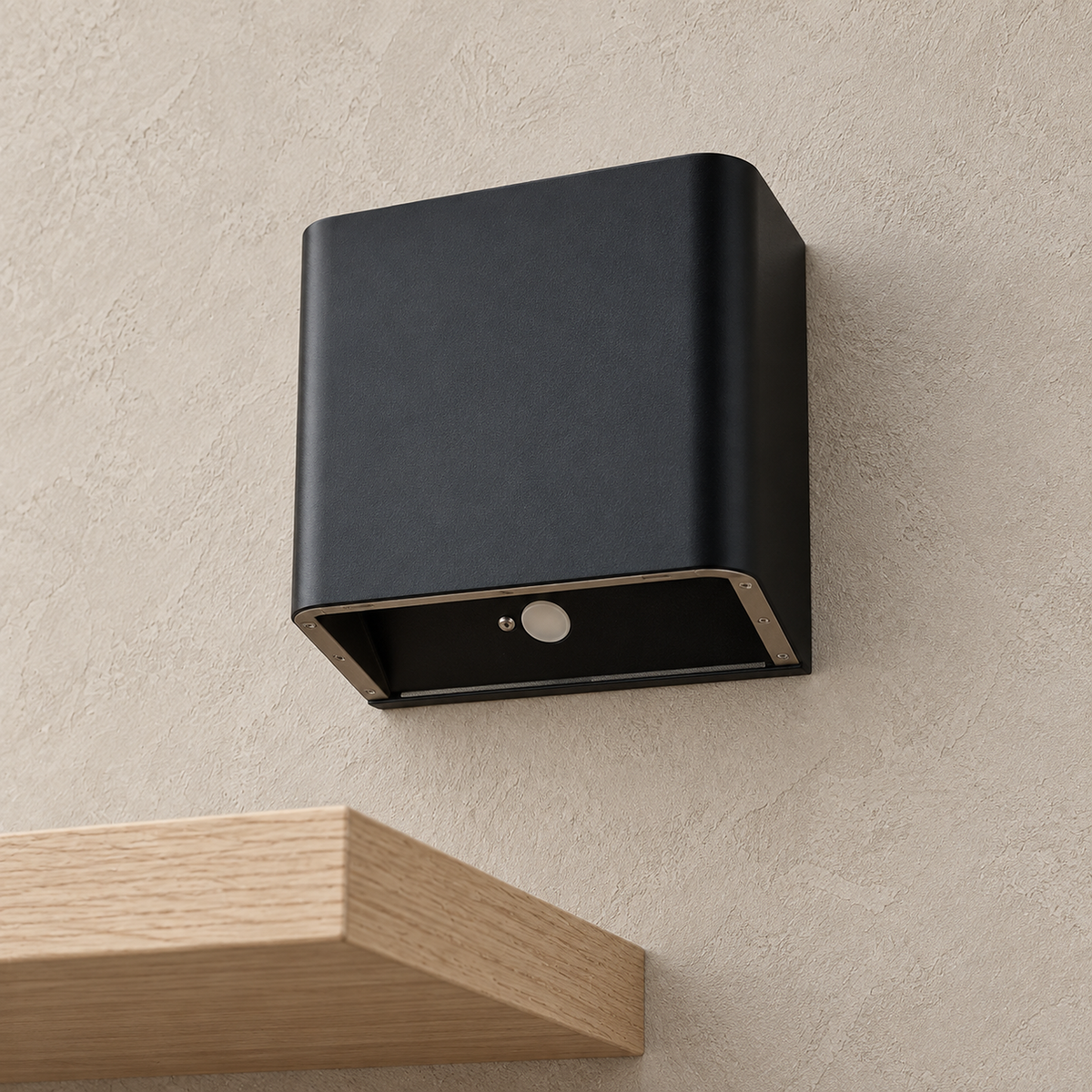 Tanelia black battery operated wall sconce close up on its lower opening and rounded finish