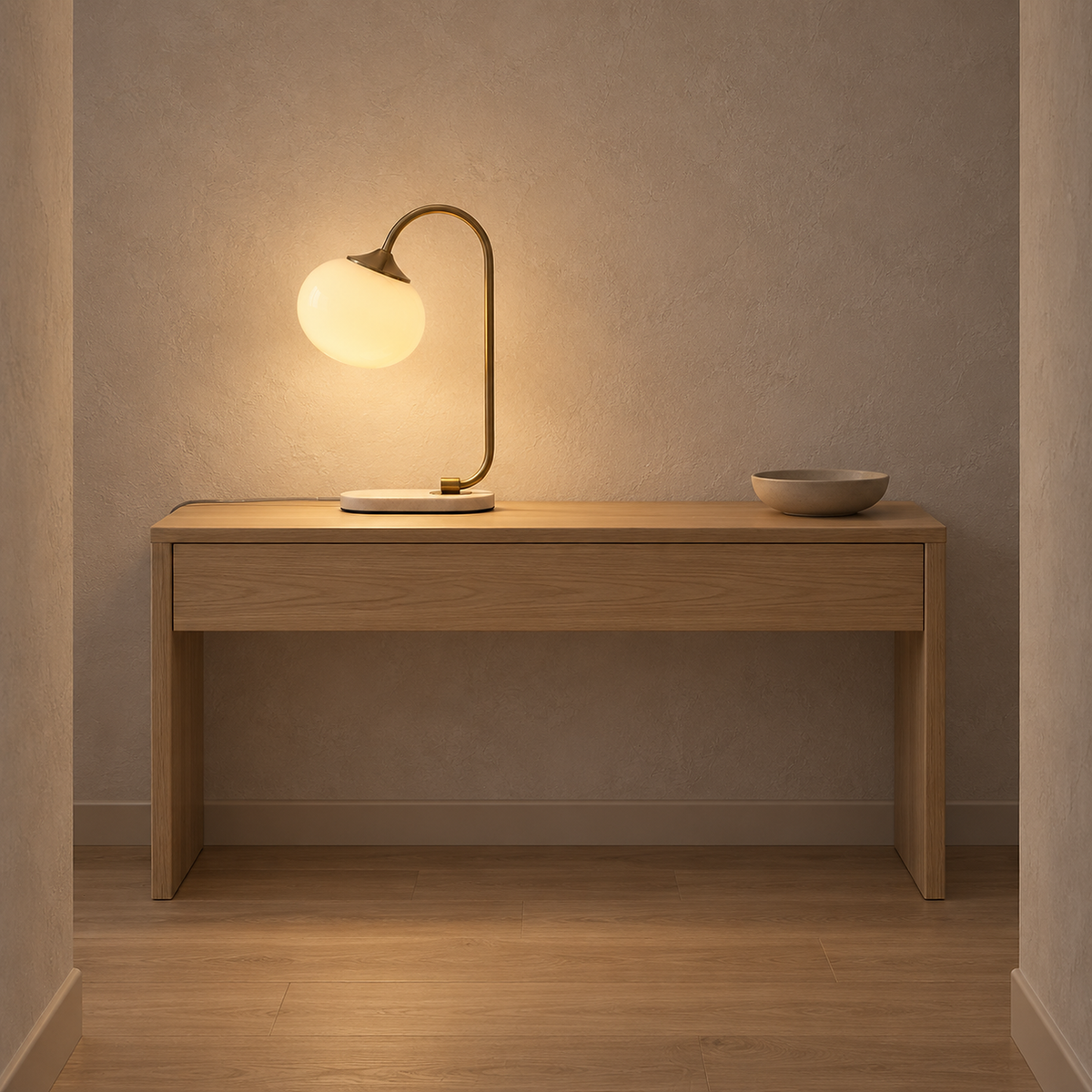 Taselvo gold and beige plug in table lamp glowing on a hallway console