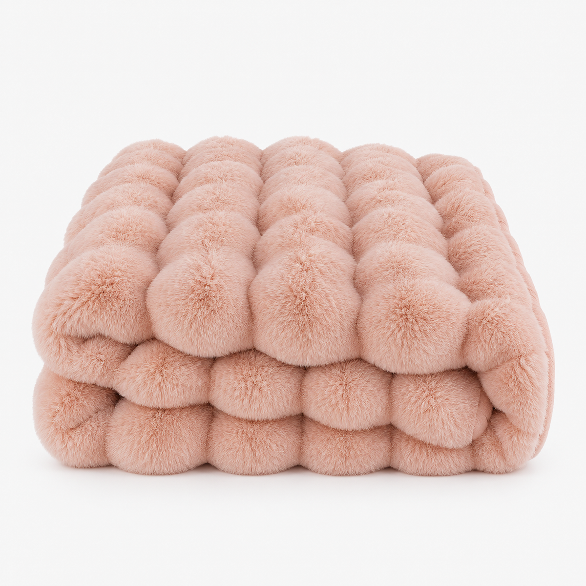 Tavenel coral fleece blanket in pink, loosely folded on a plain white background to show the brushed bubble pile