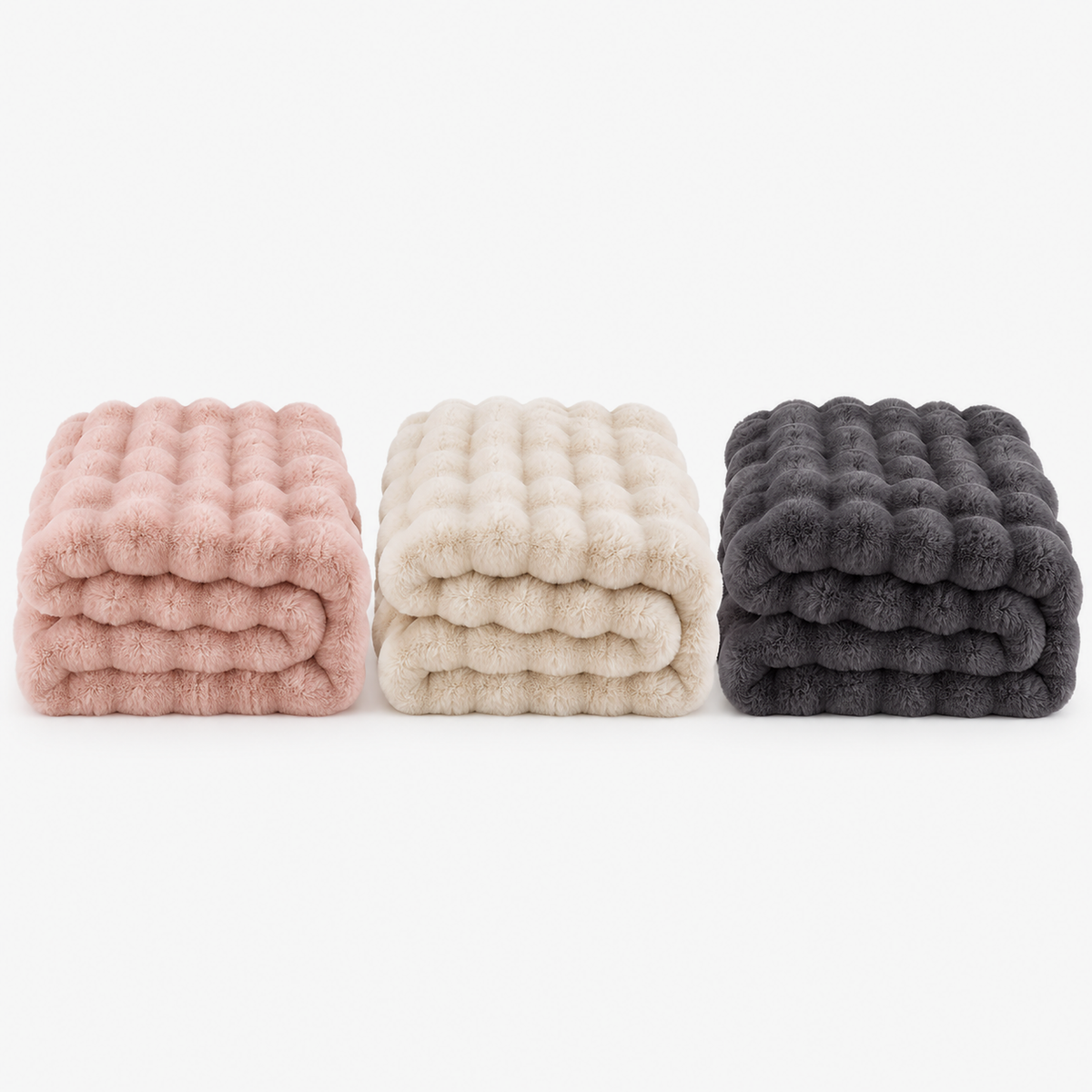 Tavenel coral fleece blanket in pink, white and dark gray, three throw blankets folded side by side