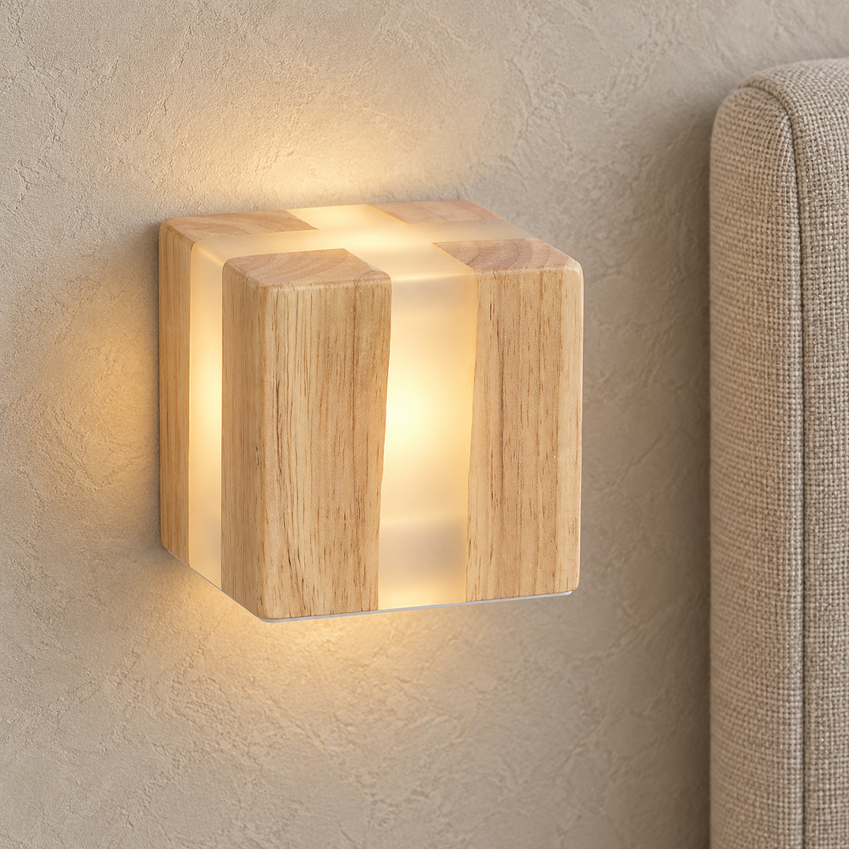 Tavimero led wall sconce glowing warm white beside a bed headboard in a bedroom