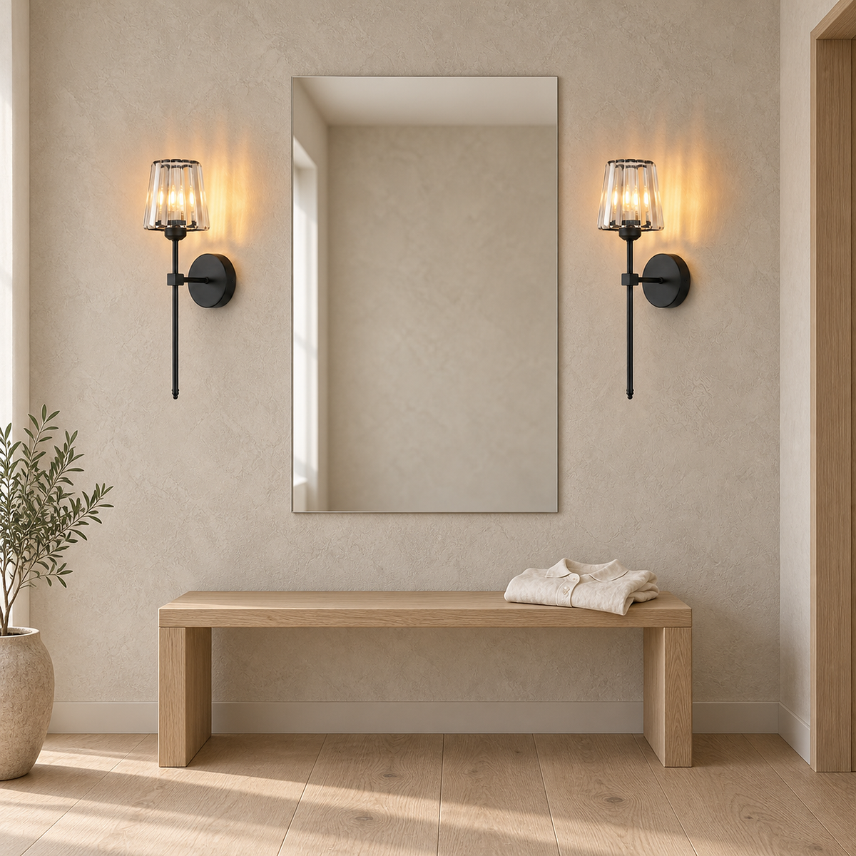 Tavirelo black battery operated wall sconces paired beside a dressing mirror and lit