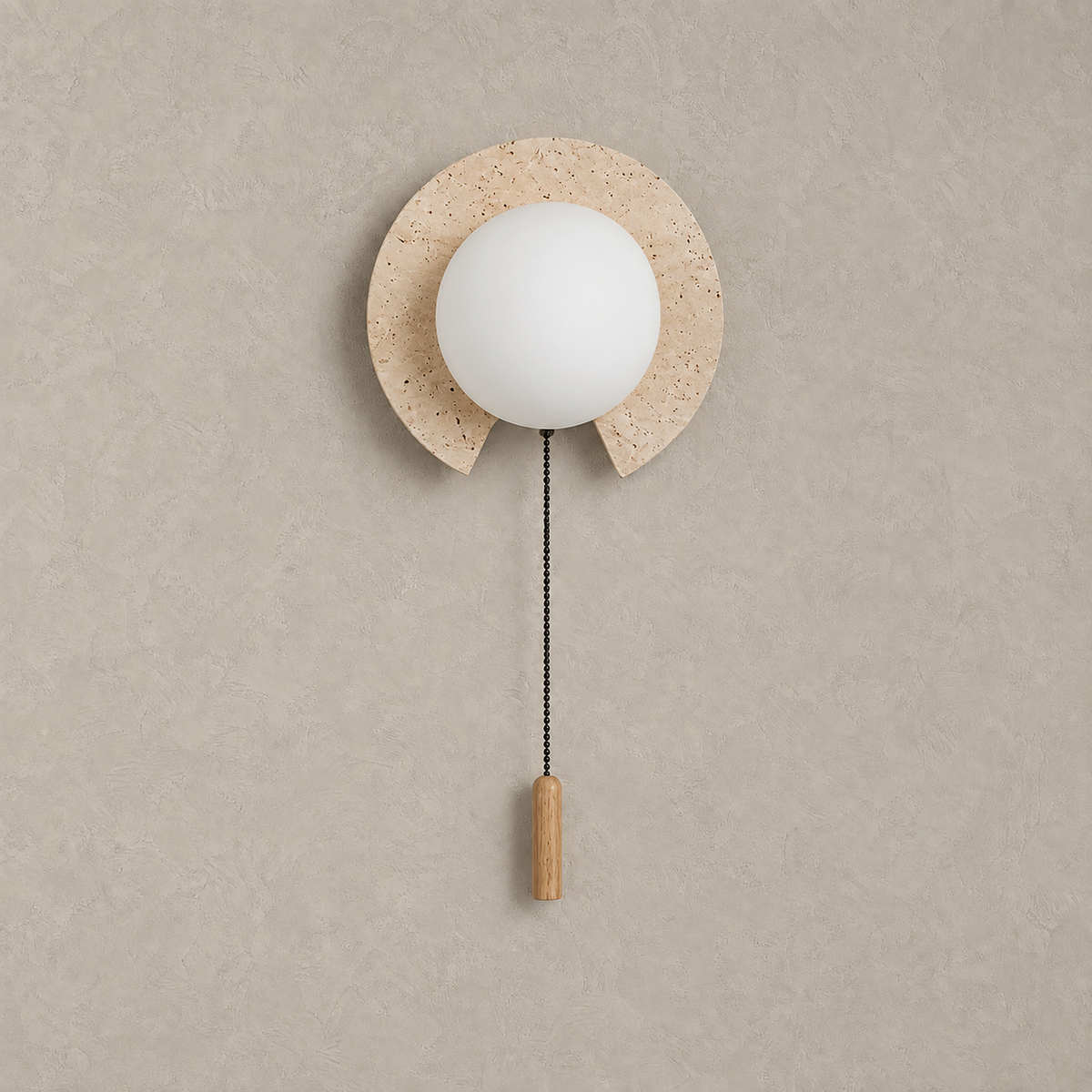 Teselma beige and white travertine wall sconce unlit with its full hanging silhouette