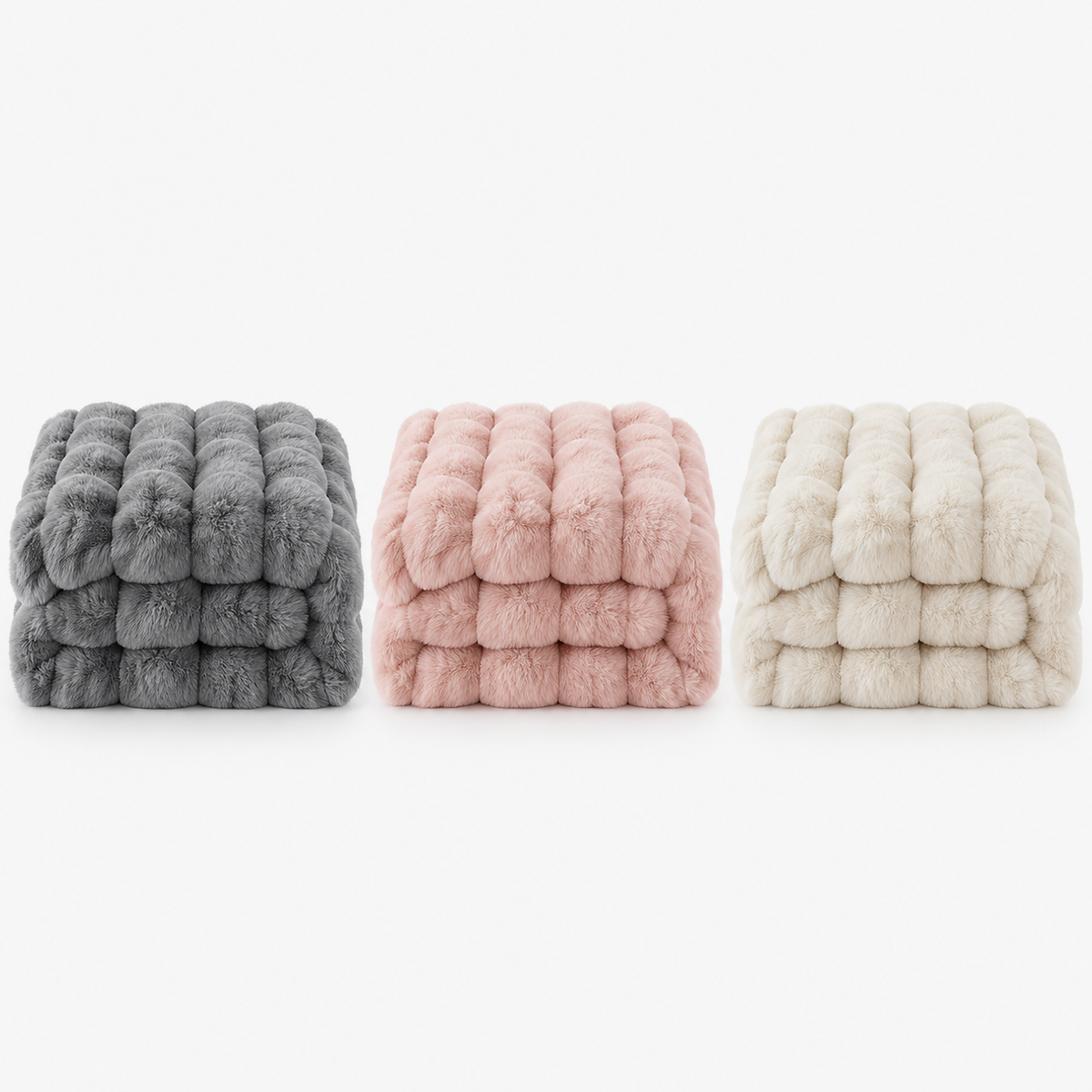 Tesovira coral fleece blanket in gray, pink and beige, three soft throw blankets folded together on a plain backdrop