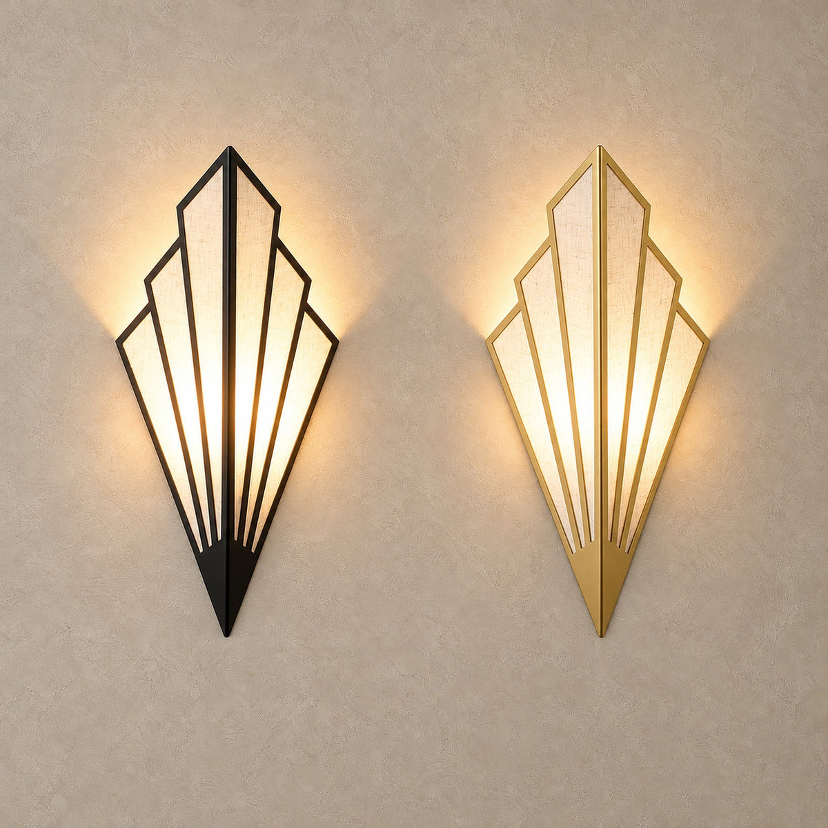 Ticorena black and gold wall sconces lit side by side to compare both finishes