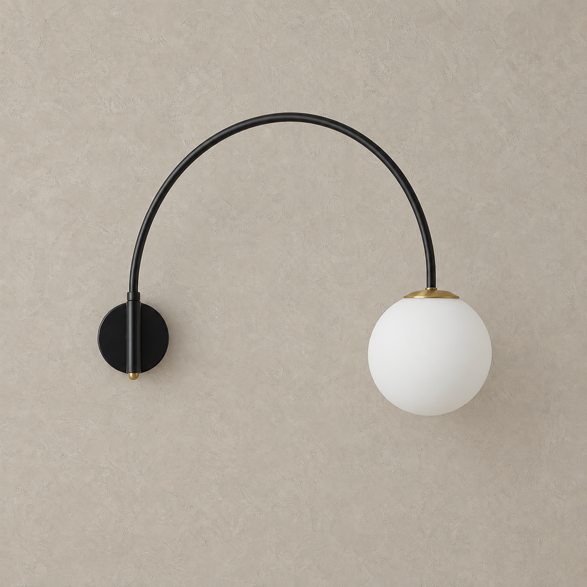 Tirsalo black and white plug in wall sconce, unlit, with arched black arm and frosted glass globe