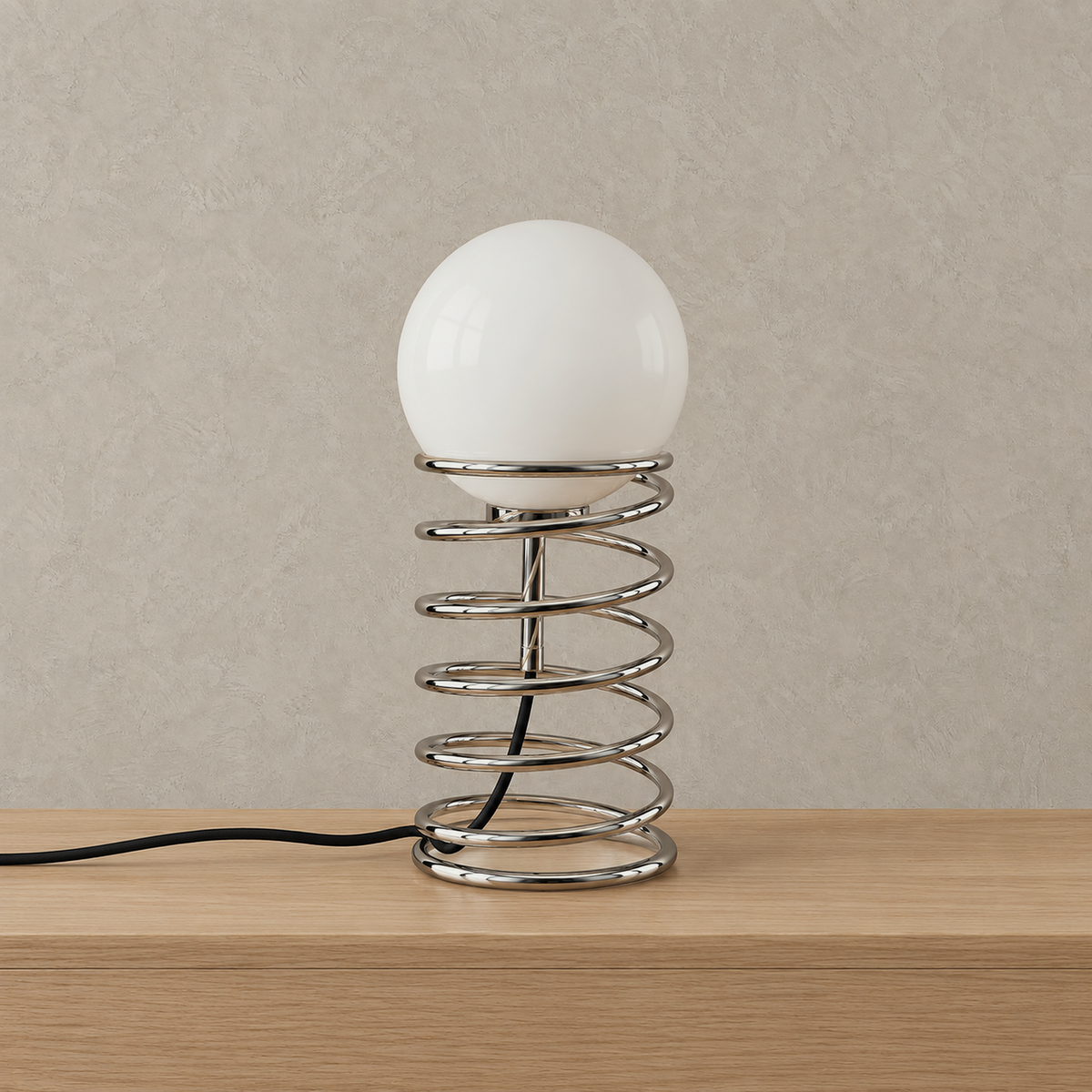 Tirvalo silver glass globe lamp unlit, with a frosted glass shade on a polished chrome spring coil base