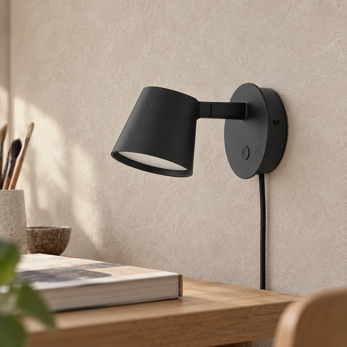 Tisello black adjustable wall sconce shade and acrylic diffuser shown in close detail