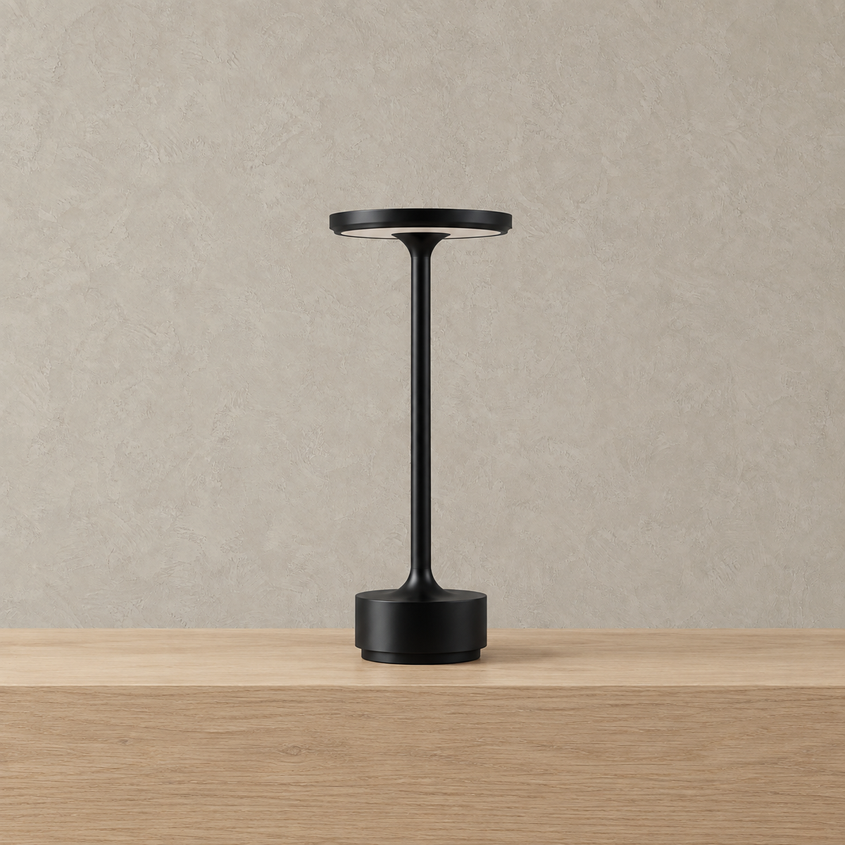 Tolimera rechargeable table lamp in black standing alone with the light switched off