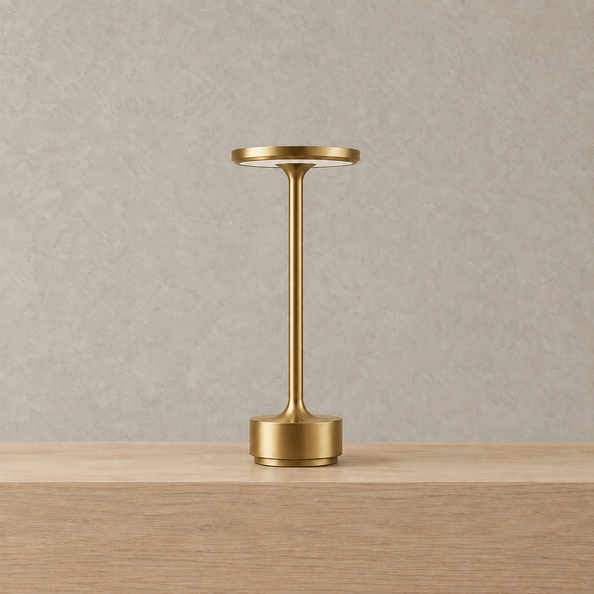 Tolimera rechargeable table lamp in gold showing its unlit finish up close #color_gold