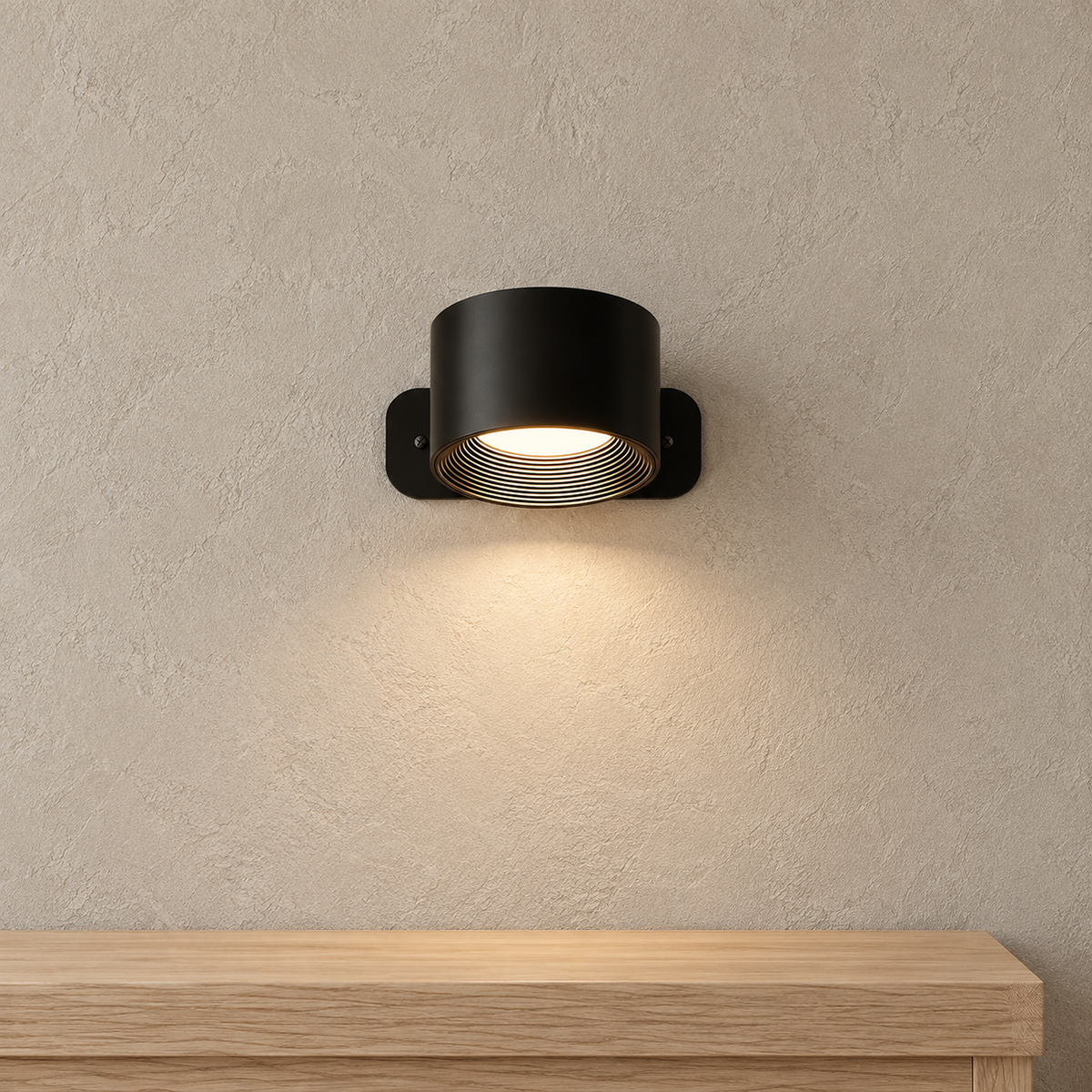 Tomelira black wireless wall light pair showing discreet mounting above an entryway console