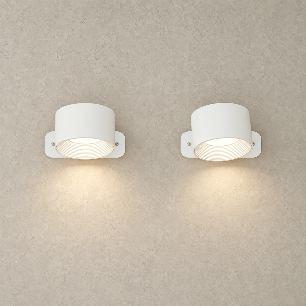 Tomelira white cordless wall lamp pair illuminated against plain greige plaster #color_white