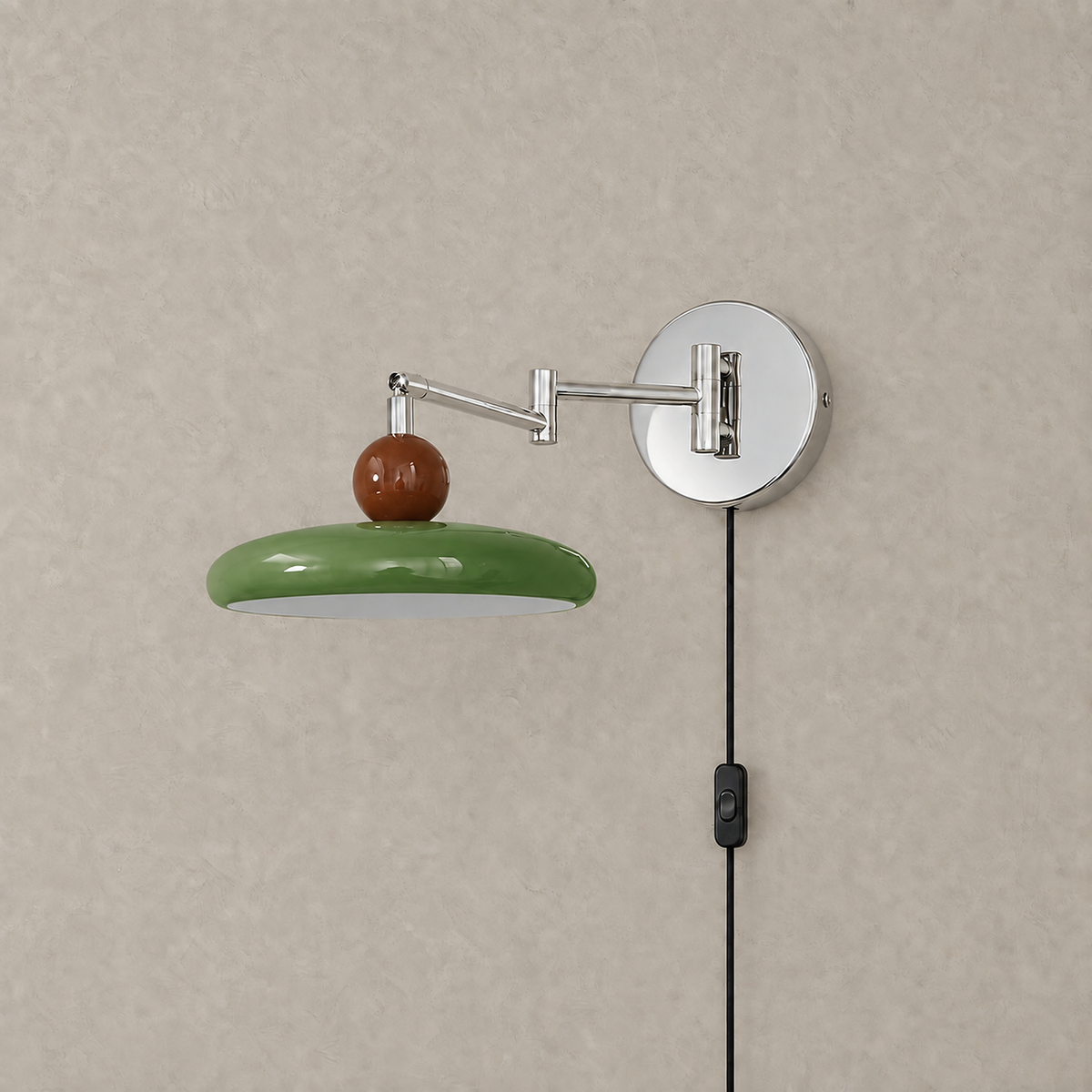 Tovessi green swing arm wall lamp unlit on a plate with a glossy shade and silver metal arm #color_green