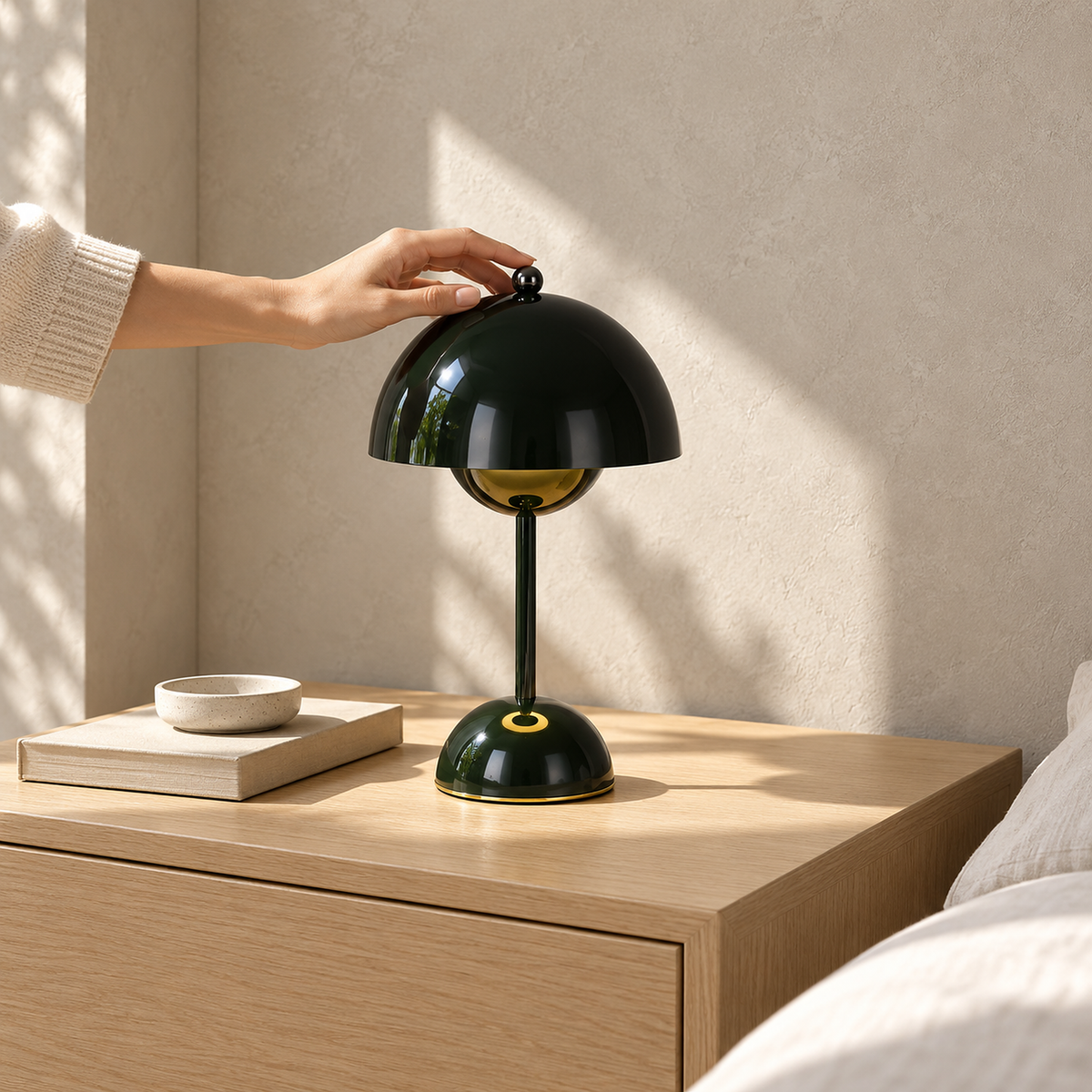 Varimel black bedside lamp sitting unlit on a small sunlit nightstand in an upstairs bedroom