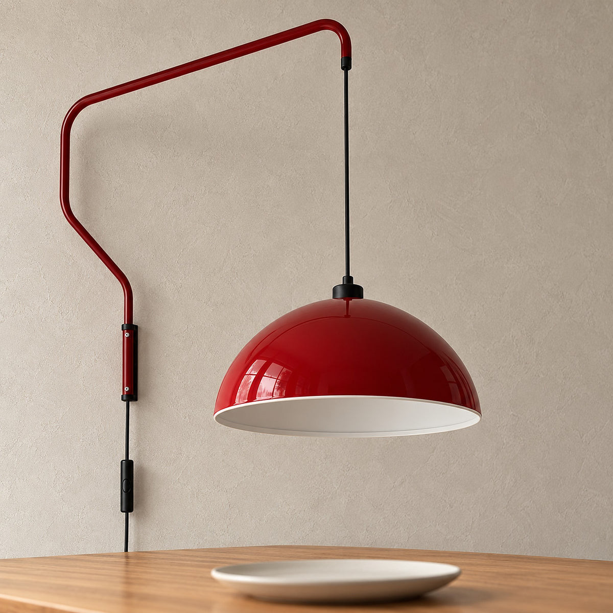 Velisano dark red plug in wall sconce, close detail of the painted dome shade and pale interior