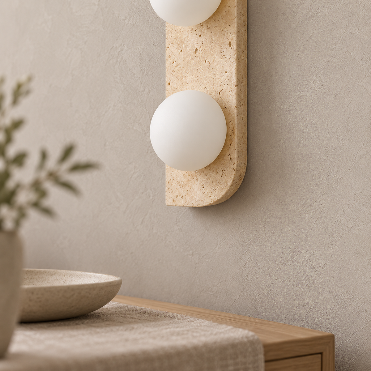 Vemarilo yellow travertine and white wall sconce showing stone texture and white globe
