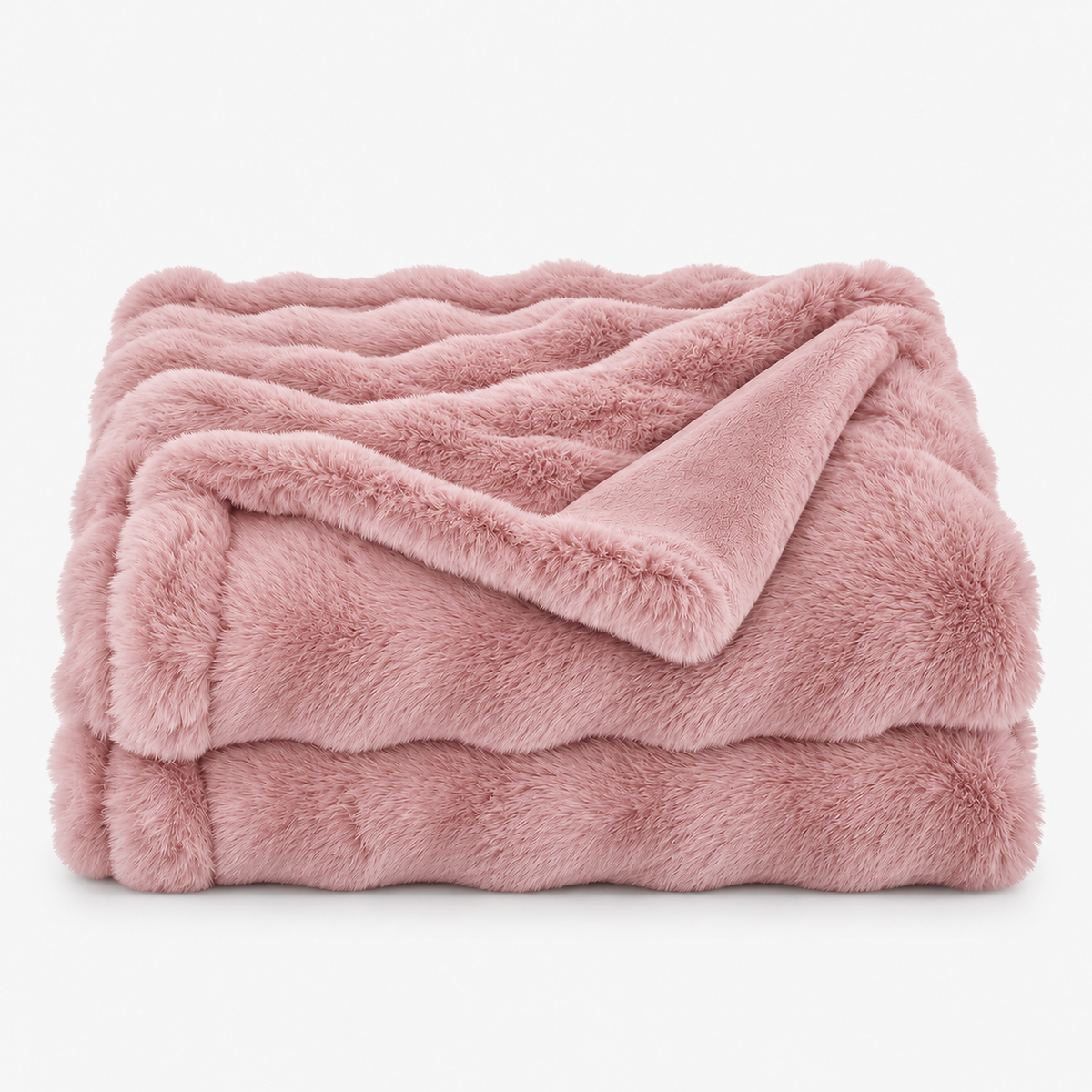 Vemorila dusty pink faux fur blanket shown loosely folded against a white background #color_dusty pink