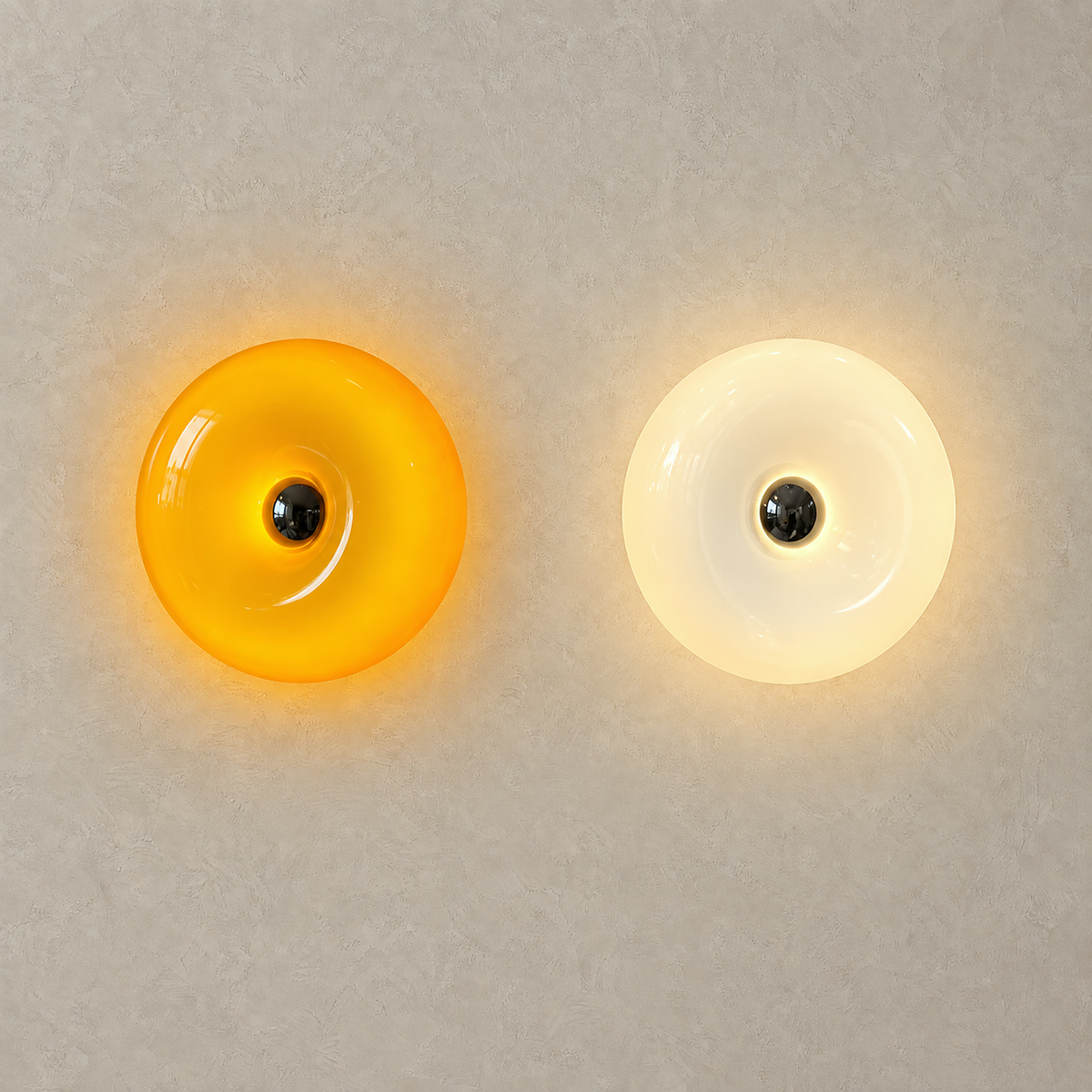 Vilomer orange and white wall lights glowing side by side, showing both glass colors