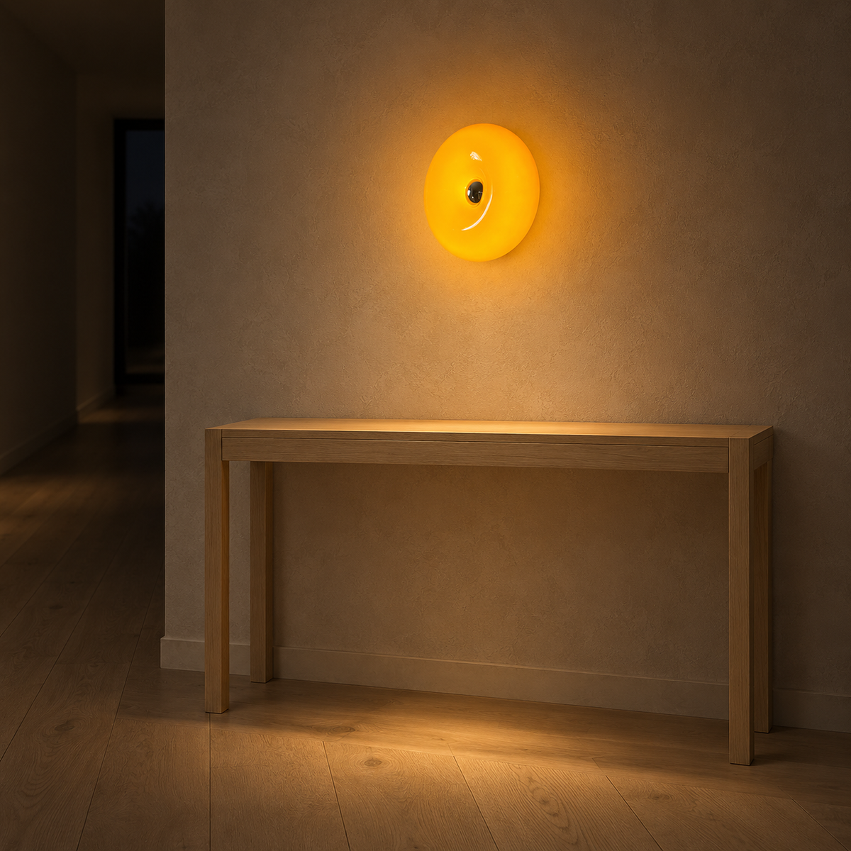 Vilomer orange wall light glowing above a hallway console at night