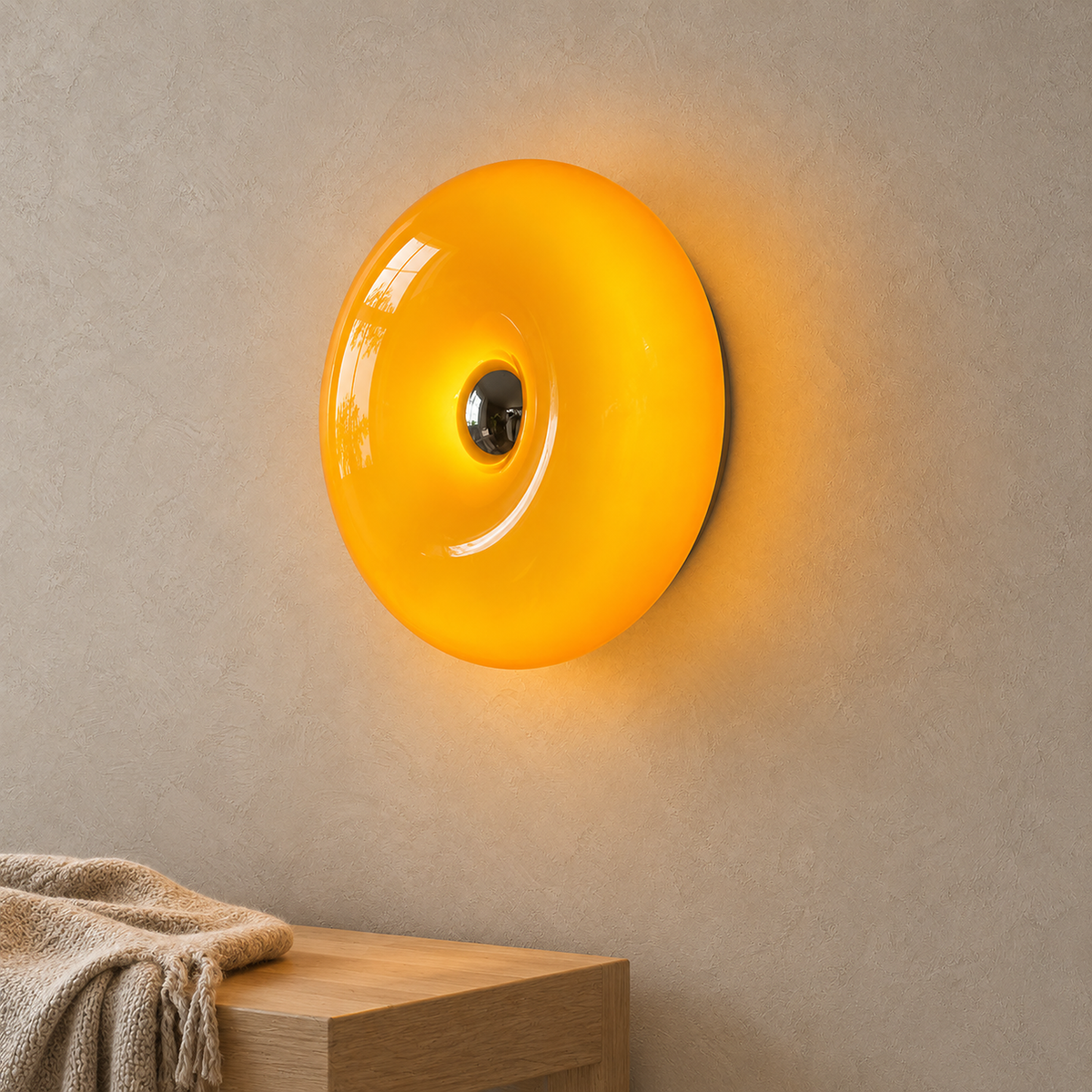 Vilomer orange wall sconce glowing above an entry bench in daylight