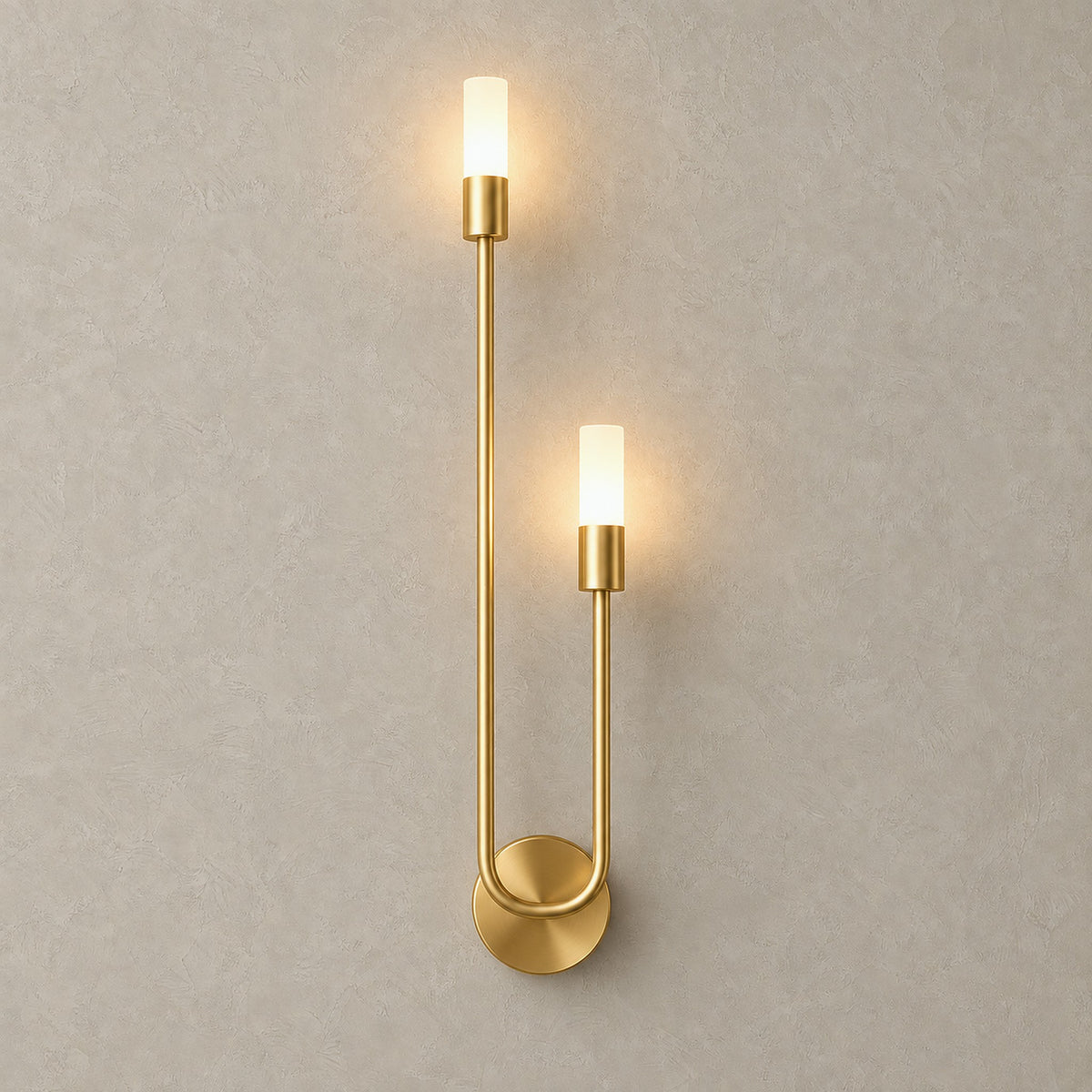 Amolven gold hardwired wall light, Right version, both heads lit on a plain backdrop