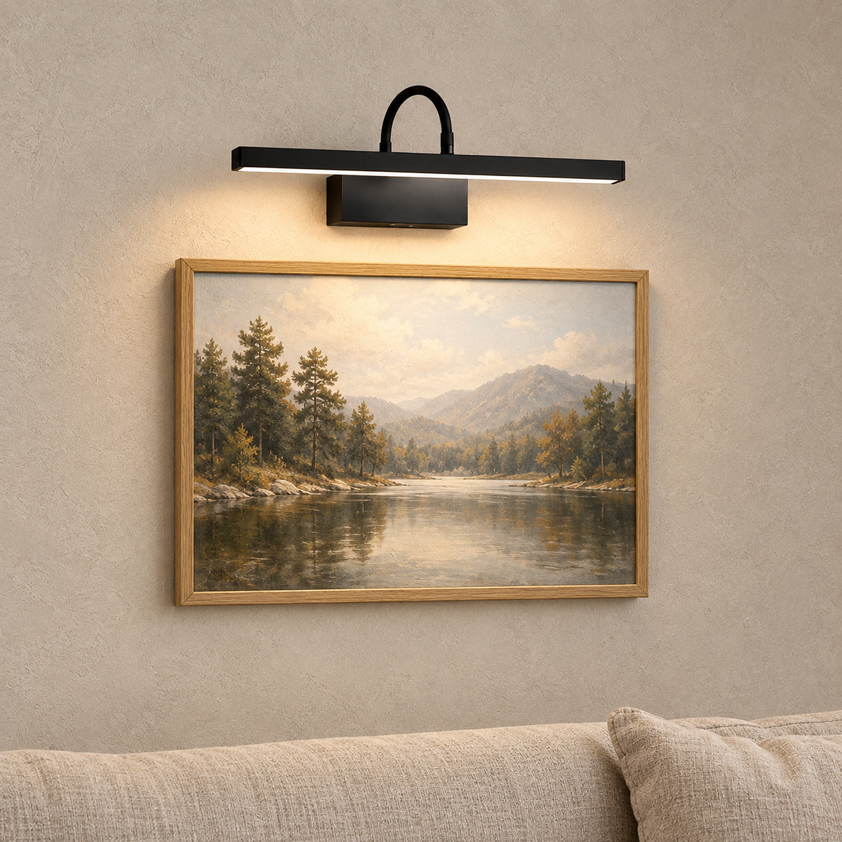 Anvelio black cordless wall lamp lighting framed art on a living room wall by day