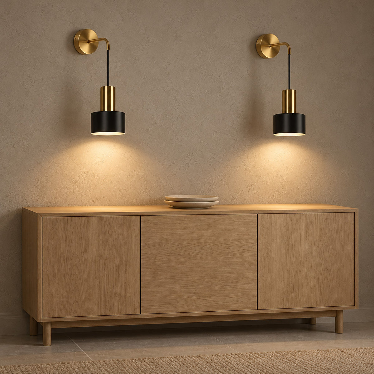 Arsomel black and gold battery operated wall sconce pair lighting a dining room sideboard