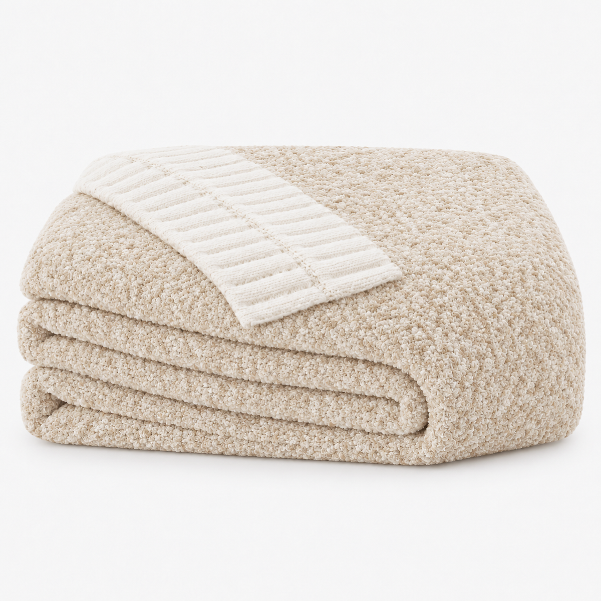 Calemira cream beige throw blanket loosely folded on a neutral white background #color_cream beige