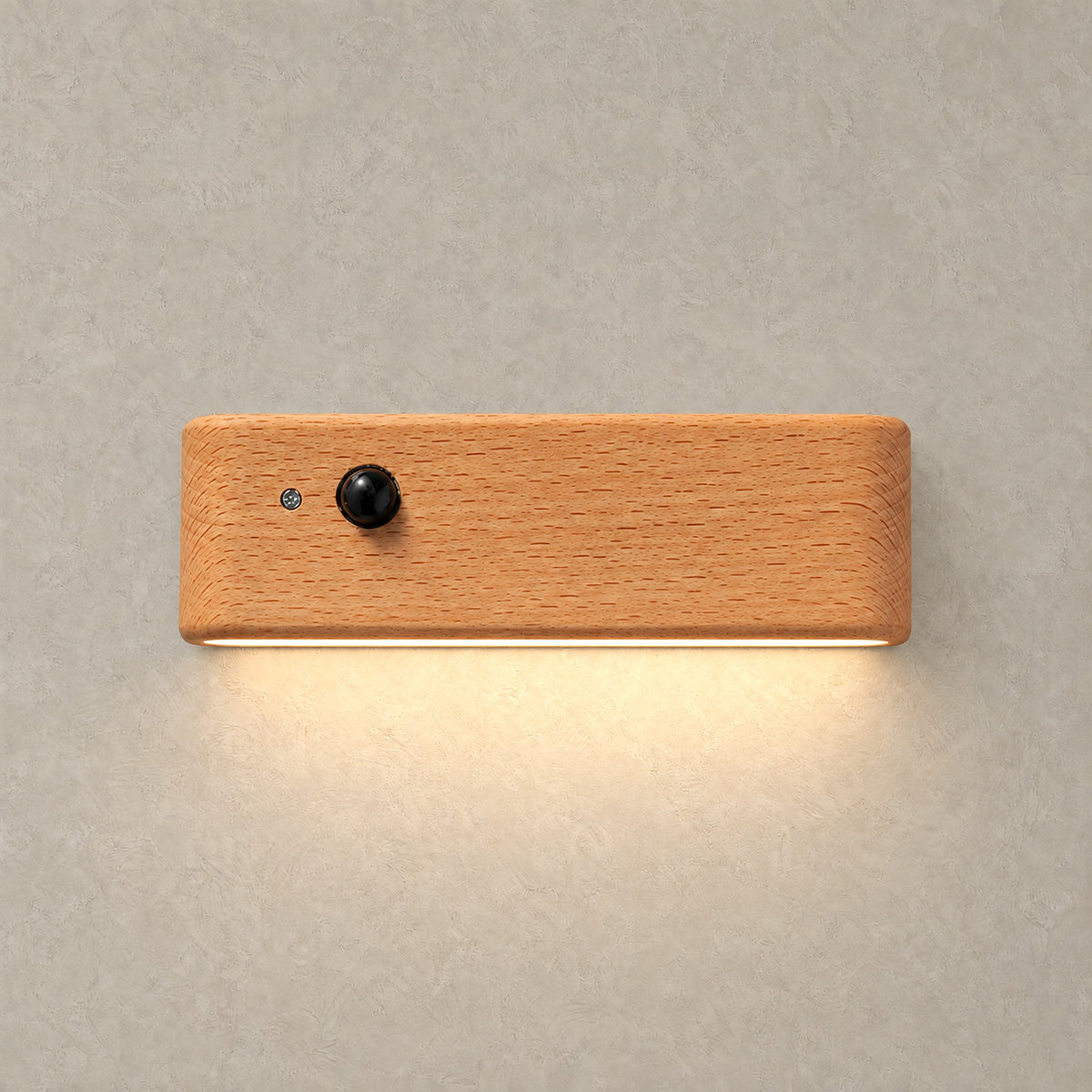 Calenvi natural motion sensor night light switched on with a warm glow through its diffuser