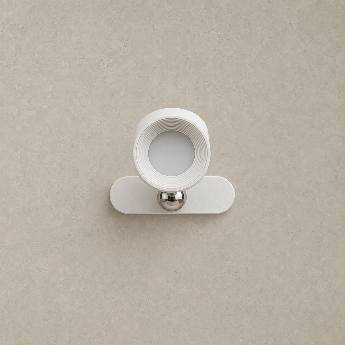 Caviloro rechargeable wall sconce in white unlit with its recessed circular face #color_white