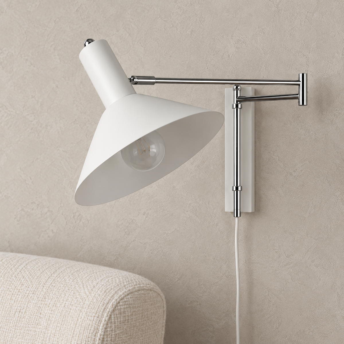 Celmoira white wall sconce close up on the shade finish and silver arm connection