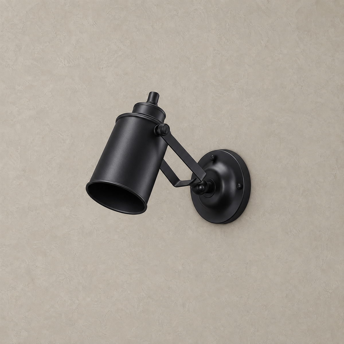 Cerimalo black plug in wall sconce, unlit on a plain plaster wall