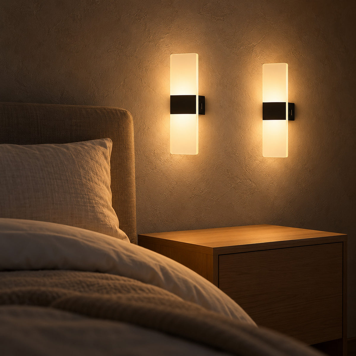 Ciloreva black battery operated wall sconce pair glowing softly beside the bed at night