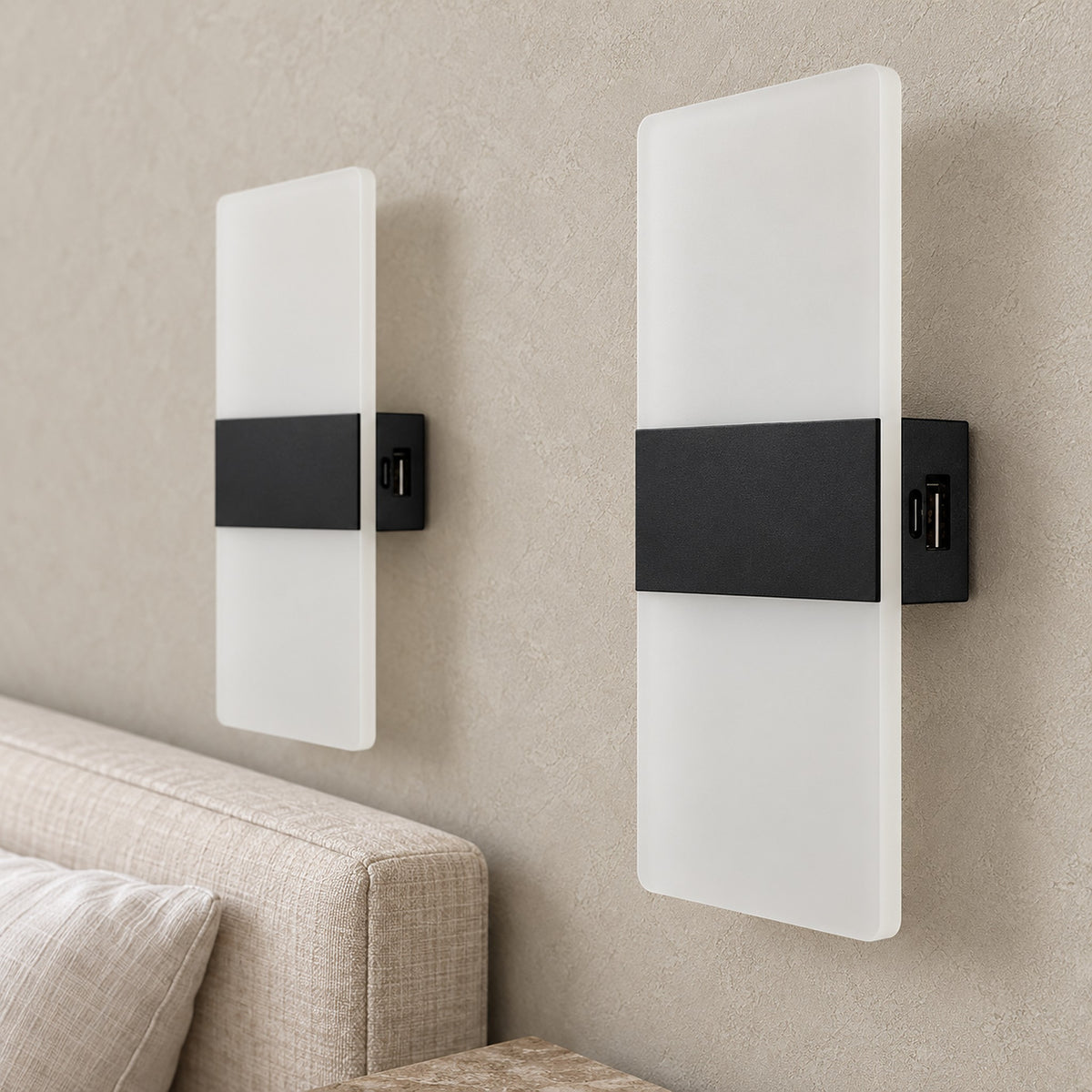 Ciloreva black wall sconce close up of the painted band and translucent acrylic panel