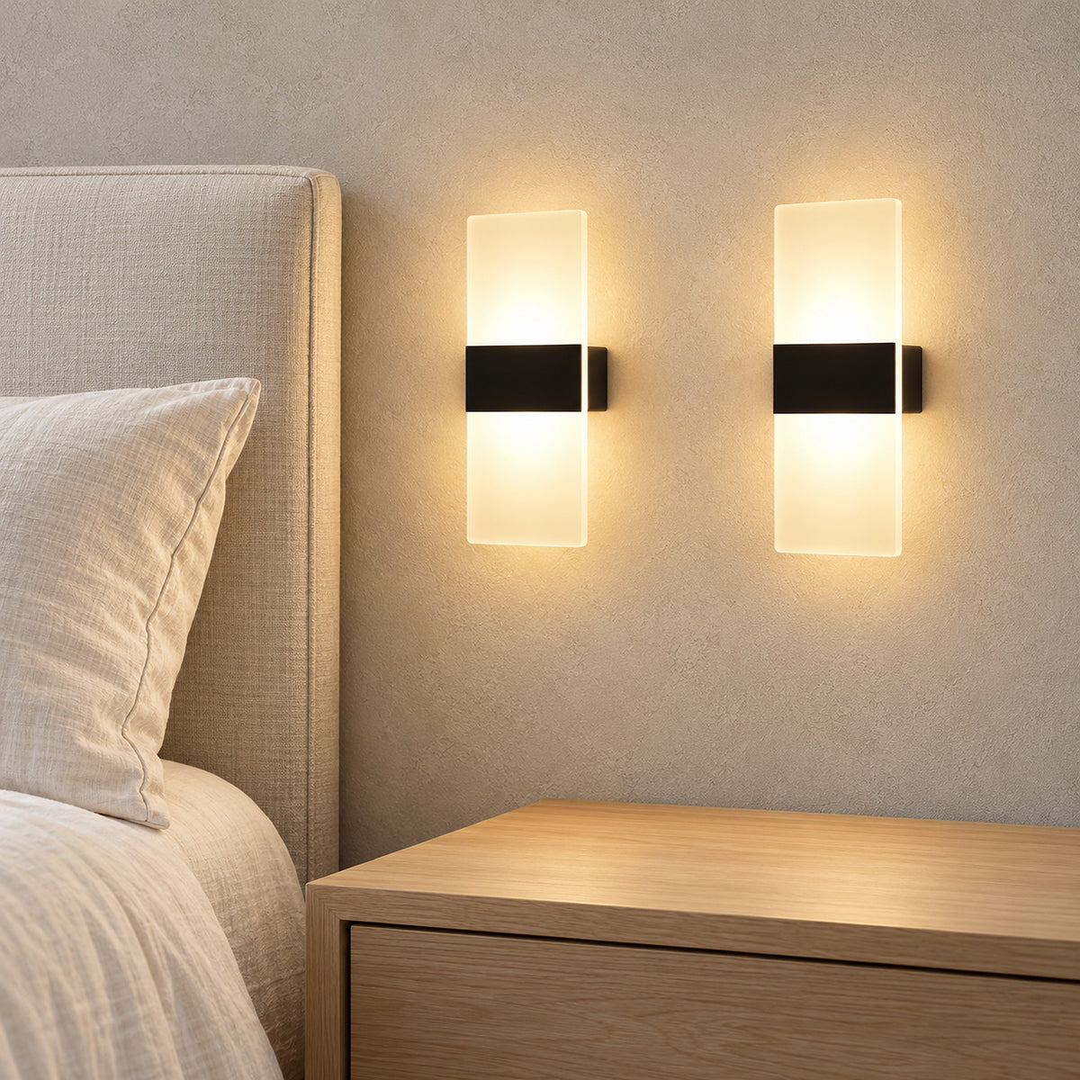 Ciloreva white wall lamp pair glowing beside an ivory headboard in a guest bedroom #color_white