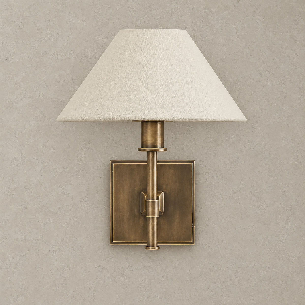 Ciralmo gold rechargeable wall sconce with fabric shade, shown unlit on a plain backdrop