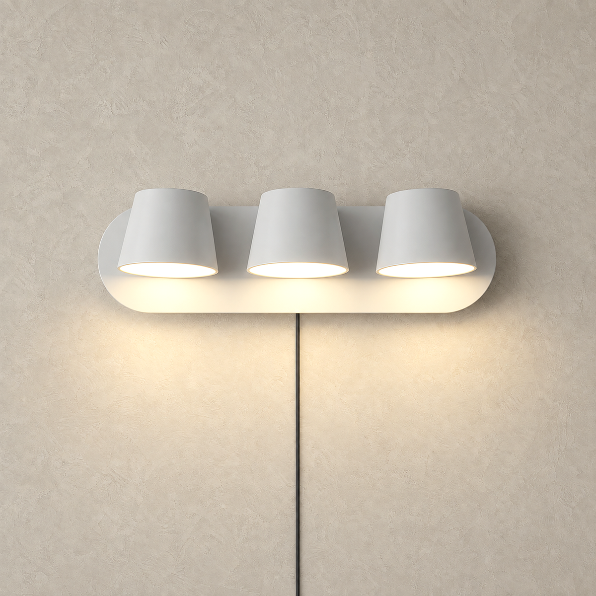 Cirelvo white three light LED reading wall sconce glowing warm on a plain studio plate #color_white