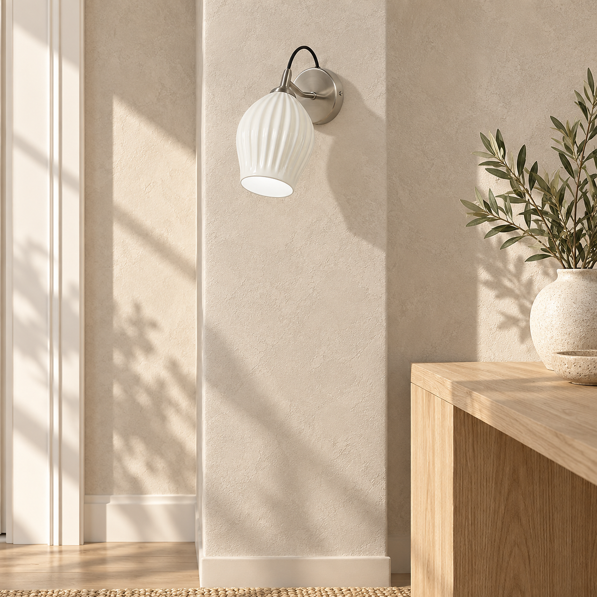 Comirel chrome wall lamp unlit on a narrow sunlit pier beside the entry