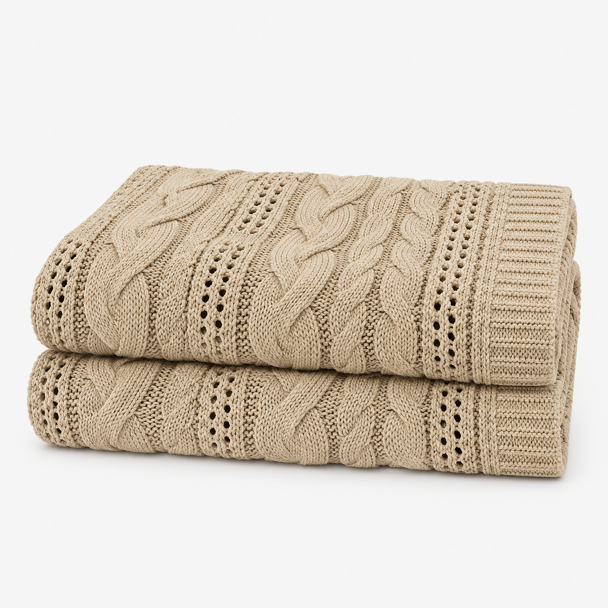 Corlavi beige chunky knit throw blanket loosely folded on a plain studio background