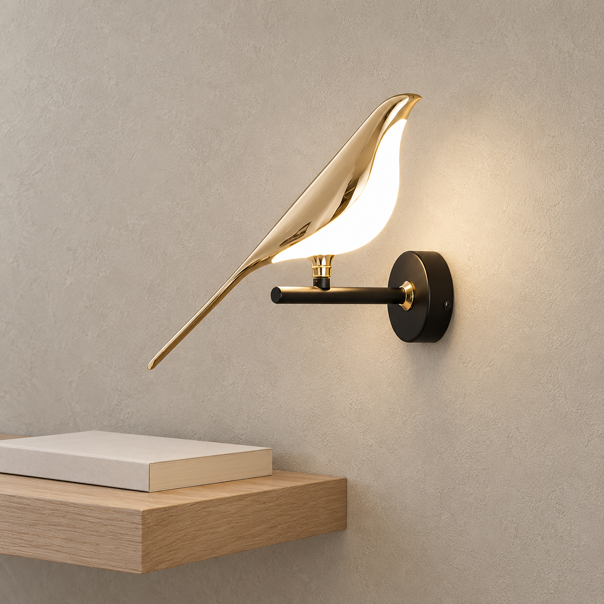 Corsavel 1 bird gold and black hardwired wall light glowing above a reading shelf